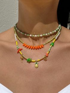 Introducing our Summer Layered Necklace set, a stunning collection perfect for the season. This set includes three handcrafted necklaces - a short beaded necklace with green and gold beads, a colorful beaded choker with orange glass beads, and a longer necklace adorned with summer charms. Versatile and exquisite, exclusively at Christina Christi Store. Elevate your summer style! 👉 My Womens Necklaces Collection: https://etsy.me/2G3pmJD 👉 Express Shipping: https://etsy.me/3ikUnOM MATERIALS - St Necklaces Beach, Necklaces Summer, Short Beaded Necklace, Necklaces Collection, Necklaces Gift, Necklaces Beaded, Summer Layers, Layering Necklaces, Sports Jewelry