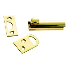 brass plated door handles and latches on a white background