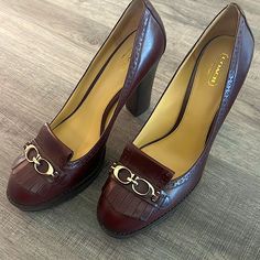 The Shoe Is A Burgundy Wine Color Platform With The Double C’s On Top With The Loafer Flap. Made With Quality Leather And The Heel And Platform Is Solid Wood. Elegant Coach Loafers For Work, Elegant Coach Loafers For Formal Occasions, Elegant Coach Heels For Office, Elegant Coach Heels For The Office, Elegant Coach Heels For Formal Occasions, Elegant Coach Loafers With Round Toe, Elegant Coach Loafers For Office, Coach Elegant Formal Loafers, Elegant Coach Loafers For Fall