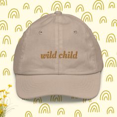 Wild Child embroidered cap! • 100% bio-washed chino cotton twill • Head circumference: 21″–21.57″ (53.3 cm–54.8 cm) • Unstructured, 6-panel, low-profile • Pre-curved visor • 6 embroidered eyelets • Adjustable self-fabric hideaway strap closure • Brass-toned tri-glide buckle • Blank product sourced from Bangladesh This product is made especially for you as soon as you place an order, which is why it takes us a bit longer to deliver it to you. Making products on demand instead of in bulk helps red Cotton Snapback Hat With Embroidered Logo And Curved Brim, Cotton Trucker Hat With Curved Bill For Everyday, Everyday Cotton Trucker Hat With Curved Bill, Everyday Cotton Dad Hat With Embroidered Logo, Cotton Snapback Hat With Letter Print And Curved Bill, Cotton Baseball Cap With Embroidered Logo And Adjustable Fit, Everyday Cotton Dad Hat With Flat Bill, Embroidered Cotton Trucker Hat With Flat Bill, Cotton Baseball Cap With Embroidered Logo And Flat Bill