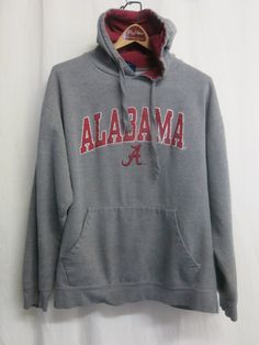 "Crimson Tide Hoodie Sweatshirt Gosh knows how this ended up here in NorCal! University of Alabama College Hoodie OVD Old Varsity Brand Very thick and plush! Front pocket This is so cool, one paint mark on underarm arm Large Cotton/Polyester  24\" shoulder 50\" chest 27\" length A real collectible! Cozy too! https://www.etsy.com/shop/BelindasStyleShop" Gray Long Sleeve Varsity Hoodie, Game Day Long Sleeve Fan Apparel Hoodie, Game Day Fan Apparel Hoodie With Long Sleeves, Winter Fan Apparel Hoodie In Athletic Heather, Gray Varsity Hoodie Sweatshirt, College Long Sleeve Sweatshirt With Kangaroo Pocket, Long Sleeve College Sweatshirt With Kangaroo Pocket, Fan Gear Hoodie, Sports Season Fan Apparel Hooded Sweatshirt