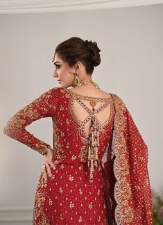 Pakistani Bridal Outfit in Kameez and Lehenga Style is an epitome of tradition and royalty. Hand-crafted details of dabka, zari, sequins, dabka, and naqshi make this beautiful Lehenga Dress an epitome of beauty and your foremost priority to have a head-turning magical look on the big day. Lehenga Kameez: The stunning kameez in an alluring red color is beautifully embellished with the intricate zardosi and fine details of embroidery, threads, motifs, dabka, naqshim, gold silver zari, and sequins. Premium quality cotton net fabric and perfect stitching make this Pakistani Bridal Dress a perfect choice to have a gorgeous wedding look. Bridal Lehenga: The embellished kameez is paired with Bridal Lehenga, creating a lavish Pakistani Bridal Outfit. The Farshi Lehenga has an alluring purple shade Farshi Lehenga, Lehenga Kameez, Bridal Lehenga Pakistani, Pakistani Bridal Lehenga, Beautiful Lehenga, Lehenga Dress, Pakistani Bridal Dress, Bridal Dupatta, Pakistani Wedding Dress