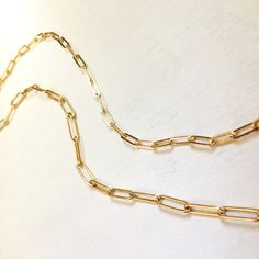 Paperclip chain necklace, Rectangle Chain Necklace, Yellow Gold Filled Chain Necklace, Gold Rectangle Link Chain Necklace, Custom Lengths New Paperclip rectangle Gold Filled chain necklace! I love this new paperclip chain necklace, it is perfect to wear everyday! This drawn flat cable chain is the newest trend in chains. It has a gorgeous 14k gold filled color and the modern look of the links makes it look great with other necklaces. It is fabulous worn alone or layered with your other favorite Delicate Chain Necklace With Rectangular Links For Gift, Rectangular Delicate Chain Necklace For Gift, Gift Delicate Chain Necklace With Rectangular Links, Gift Rectangular Delicate Chain Necklace, Gold Rectangular Paperclip Bracelet As A Gift, Rectangular Delicate Chain Necklace Gift, Gold Chain Necklace With Rectangular Cable Chain Pendant, Everyday Rectangular Pendant Chain Necklace With Delicate Chain, Gold Cable Chain Necklace