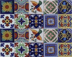 colorful tiles with different designs on them