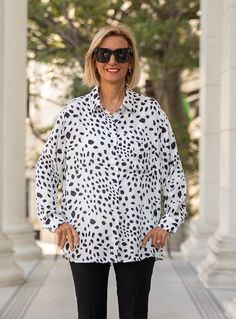 Take a look at out beautiful Ivory Black Leopard Print Silky Shirt Soft silky fabric Color: Ivory/Black Fabric content: 100% Polyester Loose body with sides slightly shorter than front and back Shirt collar and stand with small buttons in the front Has one chest pocket Back yoke with a box pleat Long sleeves with cuffs and two small button Center back length 30" White Blouse With Shirttail Hem For Fall, Silky Shirt, Dalmatian Print, Leopard Print Shorts, Back Shirt, Black Leopard Print, Just Style, Gingham Shirt, Dolman Sleeve Tops