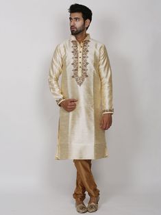 Silk Kurta pyjama With Hand Work & zari work to enrich its style with a beige/Golden colour lower to embellish your occasion This is Beautiful dress can be worn on any occassions like wedding,sangeet,reception or any religious festival Traditional Long Sleeve Sherwani For Puja, Bollywood Style Dabka Work Kurta For Traditional Ceremonies, Navratri Kurta With Naqshi In Traditional Drape, Straight Kurta With Dabka Work For Traditional Ceremonies, Straight Kurta With Dabka Work For Ceremonies, Transitional Straight Kurta For Traditional Ceremonies, Bollywood Style Unstitched Kurta For Traditional Ceremonies, Unstitched Bollywood Kurta For Traditional Ceremonies, Bollywood Style Dabka Kurta For Transitional Season