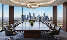 a large conference table with chairs and a plant in front of a window overlooking the city