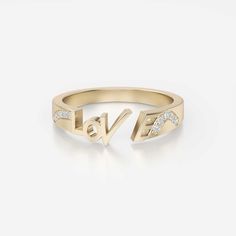 Created to be worn with other beauties or on its own, it will serve you remarkably anyway. This adorable ring with the engraved word LOVE is absolutely optimizing. This amiable ring is made to incite the hidden love inside you. Appreciate yourself and Love yourself with this bewitching ring. Adorned with 10 sparkly gemstones expertly, the total carat weight of this ring is 0.08. The flawless stone color is VS+, and the stone clarity is FG+. The alluring metal types of this band ring are 14K gold and 18K gold infused with high quality. The item weight of 14K gold is 3,265 G, and the item weight of 18 K gold is 3,865 G is perfectly bright. The total item length is 1 MM, and the item width is 2 MM. Vs Clarity Round Cut Initial Ring For Anniversary, Anniversary Initial Ring With Vs Clarity Round Cut, 14k Gold Initial Ring With Diamond Accents For Wedding, 14k Gold Wedding Initial Ring With Diamond Accents, Anniversary Fine Jewelry Initial Ring With Round Cut, Fine Jewelry Initial Open Band Ring For Anniversary, Diamond Initial Ring In Rose Gold For Promise, 14k Gold Rings With Single Cut Diamonds For Promise, Luxury 14k Gold Initial Ring For Anniversary