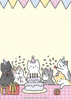 a group of cats sitting around a birthday cake