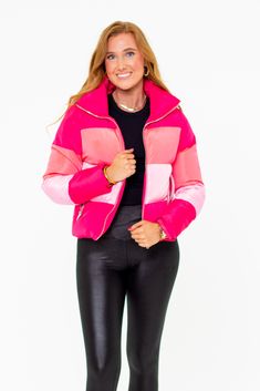 Puffer Jackets don't get more stylish than this! The Addison is the perfect addition to your winter coat collection! She features a zip up and snap closure, a color-block design, and two side pockets! Pair her with leggings, bodysuit, and sneakers for a cute on-the-go look! Product Details: Fit: The Addison Jacket fits true to size. Length: The small measures 23.5" from shoulder to hem. Bust: Accommodating to most bust sizes. Waist: Relaxed fit Fabric: ﻿Fabric does not contain stretch. Material: Pink Nylon Puffer Jacket For Spring, Pink Nylon Outerwear With Zipper Closure, Pink Nylon Puffer Jacket For Fall, Pink Nylon Outerwear For Fall, Pink Nylon Winter Outerwear, Winter Nylon Pink Outerwear, Pink Quilted Puffer Jacket For Fall, Pink Quilted Puffer Jacket For Cold Weather, Pink Long Sleeve Outerwear With Contrast Color