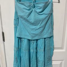 Turquoise Top And Skirt Set Mixed Sizes Both New With Tags Top Is A Large And Skirt Is A Medium. These Did Not Originally Come Together But They Just Match So Well And Looks So Cute. Let Me Know If You Would Like To Split Them Up. Light Blue Lined Skirt For The Beach, Light Blue Cotton Skirt For Vacation, Light Blue Lined Skirt For Vacation, Light Blue Beach Skirt, Light Blue Long Beach Skirt, Light Blue Long Skirt For Beach, Casual Flowy Turquoise Skirt, Turquoise Skirt For Spring, Turquoise Spring Skirt