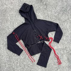 Kiki Riki Black Hoodie With Edgy Red Stitch Detailing And Bold Grommet Accents. Size Medium, New With Tag. Black Hip Hop Hoodie For Casual Wear, Black Hip Hop Hoodie For Alternative Fashion, Black Casual Hoodie For Alternative Fashion, Black Sweatshirt For Alternative Fashion, Edgy Fall Hoodie Sweatshirt, Black Long Sleeve Sweatshirt With Drawstring, Black Casual Sweatshirt For Alternative Fashion, Black Punk Sweatshirt With Drawstring Hood, Black Drawstring Sweatshirt For Streetwear