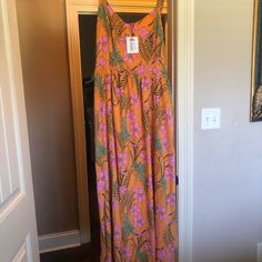 Cute Sundress Brown Maxi Dress For Casual Wear, Casual Brown Maxi Dress, Brown Floral Print Maxi Dress For Vacation, Brown Maxi Length Casual Dress, Long Brown Dress For Vacation, Brown Sundress Maxi Dress, Casual Orange Sundress Maxi Dress, Casual Long Brown Dress, Brown Maxi Length Summer Sundress