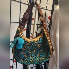 Absolutely Stunning! Front Has Intricate Beadwork. Bag Is Accented In Mahogany Leather With Brass Accents. Includes Teal Pompom Charm! Htf! Minor Scratches On Leather, Very Clean, Non Smoking Home. Excellent Vintage Condition! Brass Accents, Bead Work, Pom Pom, Bag Lady, Handbags, Shoulder Bag, Blue, Leather, Women Shopping