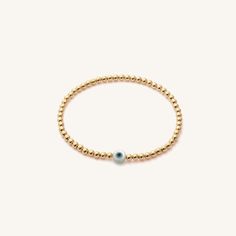 In many cultures, the Evil Eye is said to bring good luck and ward off misfortune. Whether worn for its cultural significance or simply for its beauty, this bracelet will stand out beautifully in your everyday stack. Pair it with our classic evil eye bracelet for extra luck. 14k Gold Fill 3 mm Genuine Mother-of-Pearl bead imported from Greece Sizing: 6.3" and stretches to 7". Please measure wrist prior to ordering, as we do not offer custom sizes. Make your jewelry last! Click here for jewelry c Elegant Gold Beaded Evil Eye Bracelet, Gold Beaded Evil Eye Bangle Bracelet, Dainty Gold Evil Eye Bracelet, Adjustable, Cheap Gold Hand-strung Evil Eye Bracelet, Eye Bead Bracelet, Gold-plated Evil Eye Bracelet With Adjustable Chain, Small Bead Bracelet, Bring Good Luck, The Evil Eye