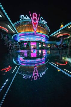 an image of a building that is lit up with neon lights and the words 80 club on it