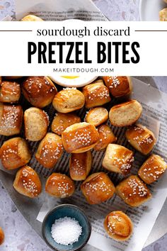 some pretzel bites are sitting on top of a table with salt and sugar