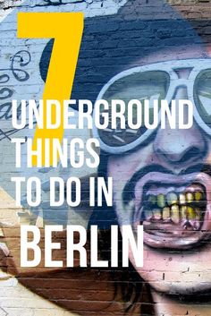 the words 7 underground things to do in berlin are painted on a wall with graffiti