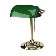 a green desk lamp on a white background