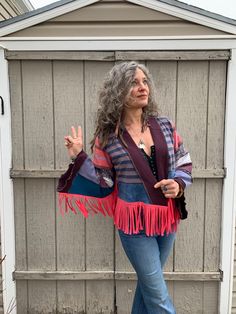 "This is a ONE of a kind, original Zasra design. It is a handmade, funky, eco friendly, artisan wrap. The design of this artisan wrap jacket, is a slouchy design with wide bell sleeves, and a slight asymmetrical front. The idea is to wear it either loose and free floating at your sides or wrap it around with a favorite sash or obi belt. If interested in a patchwork, reversible obi belt, please convo me for prices and possibilities. For this particular wrap I have chosen a bold rich mix of denim Bohemian Cotton Outerwear With Tassels, Bohemian Multicolor Outerwear With Tassels, Bohemian Long Sleeve Fringe Outerwear, Handmade Hippie Outerwear For Festivals, One Size Hippie Outerwear For Fall, One Size Bohemian Outerwear With Tassels, Bohemian One Size Outerwear With Tassels, Bohemian Outerwear With Tassels, One Size, Handmade Hippie Festival Outerwear