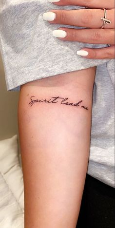 a woman with a small tattoo on her arm that says, sweet girl in cursive writing