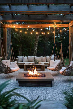 31 Rustic Fire Pit Ideas for an Outdoor Oasis Fire Pit Mountain House, Garden Fireplace Ideas Outdoor, Backyard Gazebo With Fire Pit, Garden Design With Fire Pit, Outside Cozy Area, Whiskey Barrel Fire Pit, Covered Fire Pit Ideas Backyard, Deck With Fire Pit Ideas, Cabin Outdoor Ideas Backyards