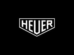 the heuer logo is shown on a black background with white letters in the center