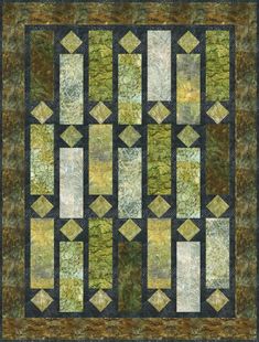 a quilt made with green and yellow squares