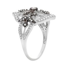 A decorative floral and cross motif adorned with black and white diamonds gives this ring distinctive style. Add a beautiful touch to your ensembles wearing this sterling silver ring. Comes in a gift box. Click on this JEWELRY & WATCHES GUIDE to learn about fit, styles, materials and more!RING DETAILS Width: .82 in. Metal: white rhodium-plated sterling silver, black rhodium-plated sterling silver DIAMOND DETAILS Total weight: 3/8 ct. Cut: round Color grade: H-I Clarity: I1-I2 Setting: prong Imag Elegant Rings With Black Diamonds In Diamond White, Diamond White Ring With Black Diamonds, Elegant Silver Diamond Ring With Black Diamonds, Elegant Diamond White Rings With Black Diamonds, Diamond White Rings With Black Diamonds, Luxury Silver Flower Ring With Single Cut Diamonds, Luxury Silver Diamond Ring With Black Diamonds, Fine Jewelry Diamond White Ring With Black Diamonds, Fine Jewelry Diamond Ring With Black Diamonds