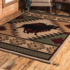 a living room with a chair and rug on the floor