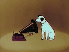 a cartoon dog is looking at an old fashioned radio that's sitting on the ground