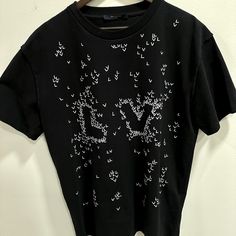 Louis Vuitton Lv Spread Embroidery T-Shirt. I Have Never Worn The Shirt. It Is A Thicker Material And Very Nice But My Preference Is Thinner Shirts. Black Tops With Embroidered Logo For Spring, Designer Spring Tops With Letter Print, Designer Letter Print Tops For Spring, Designer Tops With Letter Print For Spring, Louis Vuitton Shirts, Embroidery T Shirt, Embroidery Tshirt, T Shirts Men, Tie Design