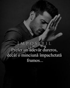 a man in a suit holding his hands to his face with the words impostibi