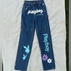 Playboy Denim Jeans With Designs They Are Basically Brand New I Only Wore Them Once & They Are Still In Excellent Condition Size 23 High Waisted Straight Leg Spring Letter Print Medium Wash Jeans, Blue Graphic Print Y2k Bottoms, Y2k Blue Bottoms With Graphic Print, Y2k Blue Graphic Print Bottoms, Blue Y2k Graphic Print Bottoms, Blue Jeans With Letter Print For Summer, Spring Denim Jeans With Letter Print, Medium Wash Denim Jeans With Letter Print, Trendy Medium Wash Jeans With Graphic Print