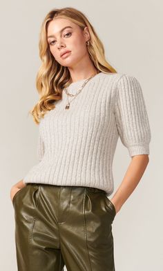 Soft and cozy, our Francis knit top is knitted from a marled rib knit in a neutral grey/taupe shade. It has a medium weight to the touch. Crew neckline with short sleeves, has ample stretch and it's meant to fit slim and easy. Length from shoulder to hem: 22 1/2" Across chest: 15 1/2" Sleeve length: 12 3/8“ imported 70% Acrylic / 16% Angora / 6% Nylon / 2% Spandex Style #: G106W5617 Knit Short Sleeve Top, Short Sleeve Knit Top, Knit Short, Knit Tops, Knit Shorts, Sweaters Knitwear, Fall Looks, Ribbed Sweater, Sweater Weather