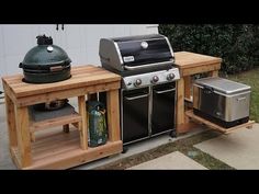 an outdoor bbq with grill and sink built into it