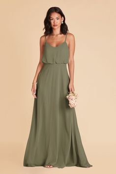 a bridesmaid in a long green dress