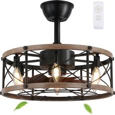 a light fixture with three lights on it and a remote control attached to the ceiling