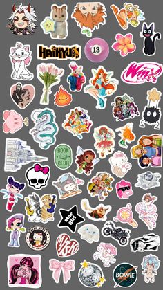 an assortment of stickers on a gray background