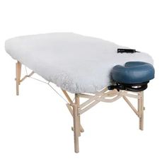 Earthlite's DLX Digital Warmer boasts a soft fleece cover and advanced digital warming pad that allows for customizable heat up to 135°F and timer settings for up to 10 hours. With overheat protection and automatic shutoff, you can feel safe and secure. Features TWO-IN-ONE MASSAGE TABLE WARMER & FLEECE PAD - Your clients will stay warm and cozy this premium 1” (2.5cm) thick fleeced heating pad in the coldest of environments. PROPRIETARY DIGITAL TOUCH SCREEN HAND CONTROL – Makes programming easy. Massage Equipment, Massage Tables, Professional Massage, Massage Table, Towel Warmer, Table Pads, Heating Pad, Self Service, Safety And Security