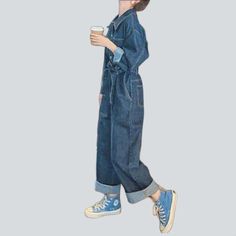 Be transported back to the Pre-millennium with our 2023 Spring-Summer Collection medium wash baggy denim overall! A timeless classic with modern day flair. this one-of-a-kind piece will have you feeling nostalgic and looking fashionably hip. Crafted from luxe denim and featuring a bold buttoned closure. this overall exudes retro chic sophistication.Distinctive Features: 90s Style: Relive the 90s in style with this classic denim overall. Medium Wash: A timeless wash that adds a touch of effortles Casual Denim Blue Overall Jeans, Casual Denim Blue Jean Overalls, Casual Straight Leg Denim Blue Overalls, Trendy Relaxed Fit Medium Wash Denim Jumpsuit, Wide Leg Cotton Denim Jumpsuit In Dark Wash, Dark Wash Wide Leg Relaxed Fit Overalls, Casual Denim Jumpsuit With Straight Leg, Casual Dark Wash Denim Overalls, Spring Indigo Denim Jumpsuit With Pockets