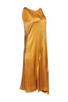 A true closet essential, this gold slip dress by Vince is an all-purpose style. Crafted from smooth silk with a v-neck, it stands alone or can be paired with a range of tops: blazers, jackets, and oversized sweaters. Wear it all year-long and pack it for travel as it's truly perfect for any occasion! Size S 100% Silk Sleeveless Slip style V-neck Bias cut Bust 36" Waist 35" Shoulder to hem 45.5" Gold Slip Dress, Oversized Sweaters, Closet Essentials, Buy Shoes Online, Gold Silk, Contemporary Outfits, Sweaters Oversized, Sweater Weather, Black Tie