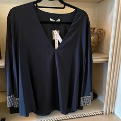 Brand New, Elegant Blouse. Black Silk With Beaded And Metallic Flared Long Sleeves. Retails For $440 For The Low Price Of $440. Drapes Beautifully. Elegant V-neck Top For Night Out In Spring, Elegant V-neck Top For Date Night, Elegant Split Neck V-neck Top For Spring, Formal V-neck Blouse For Fall, Elegant Fitted Split Neck Blouse, Elegant Fitted Top With Split Neck, Elegant V-neck Top For Fall Parties, V-neck Blouse For Date Night, Black V-neck Blouse For Formal Occasions