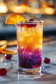 a drink with ice, cherries and an orange slice