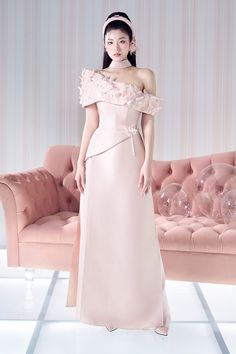 Elevate your style with our Ao Dai. Crafted from luxurious taffeta, this floor-length piece features an asymmetric neckline for a contemporary touch. The A-line silhouette flatters all body types, making it the perfect choice for any special occasion. Length: 140cm (+-2cm) Pink Taffeta Evening Dress For Wedding, Pink Taffeta Evening Dress For Formal Occasions, Pink Asymmetrical Neckline Gown For Gala, Elegant Pink Asymmetrical Evening Dress, Pink Gown With Asymmetrical Neckline For Gala, Elegant Asymmetrical Pink Evening Dress, Feminine One-shoulder Formal Evening Dress, Asymmetrical Satin Wedding Gown, Feminine One Shoulder Formal Evening Dress