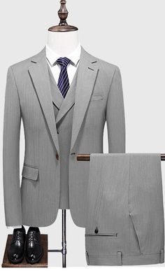 The Light gray 3 piece suit is part of our formal wear collection where the formal look is enhanced through our unique double breast notch lapel waistcoat. Light grey suit making it ideal for any occasion and any season. Elegant Gray Double Breasted Suit For Semi-formal Occasions, Gray Formal Blazer With Suit Collar, Gray Blazer With Suit Collar For Formal Occasions, Gray Double Breasted Suit For Office, Gray Double-breasted Suit For Office, Classic Gray Double Breasted Suit For Office, Gray Suits With Lapel Collar For Work, Elegant Gray Double Breasted Suit For Formal Events, Gray Notch Lapel Suit For Business Casual