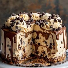 a chocolate chip ice cream cake with one slice cut out and ready to be eaten