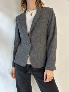 "- Vintage Chaus gray blazer jacket - Wool poly blend - Padded shoulders - Made in Hong Kong - Tagged 7/8 Chest: 18\" Waist: 16\" Length: 23\"" Gray Wool Blazer With Lapel Collar, Gray Tweed Jacket With Welt Pockets For Work, Classic Gray Tweed Jacket For Work, Gray Wool Blazer With Welt Pockets, Gray Tweed Jacket With Suit Collar For Work, Gray Blazer With Welt Pockets For Office, Gray Single Button Blazer For Office, Gray Single-button Blazer For Office, Gray Notch Lapel Tweed Jacket For Work