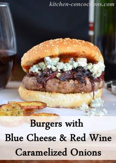 burgers with blue cheese and red wine caramelized onions are on the table