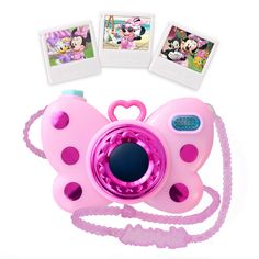 a pink camera with minnie mouse pictures on it